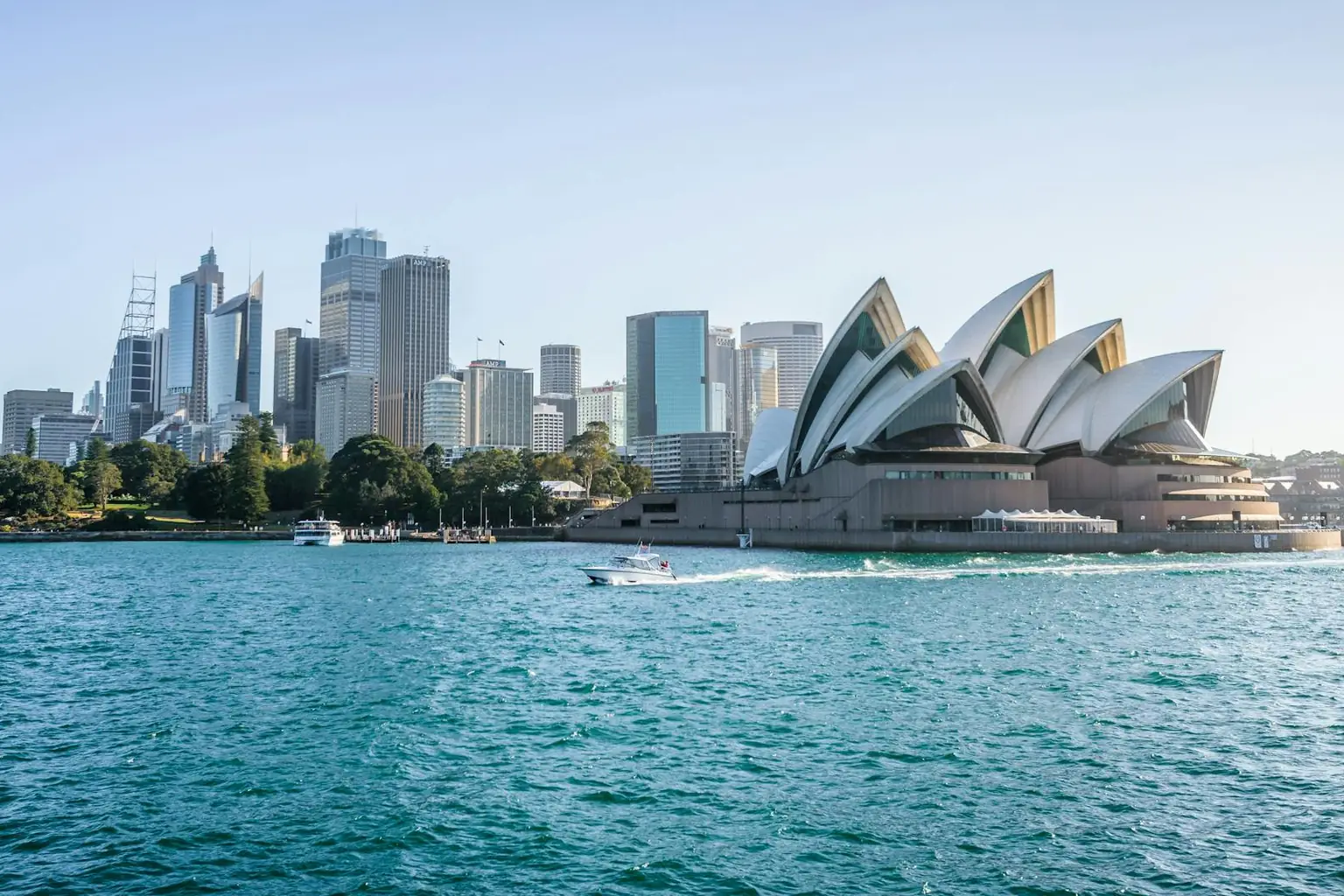 The Sydney CBD skyline and the Opera House seen across the harbour