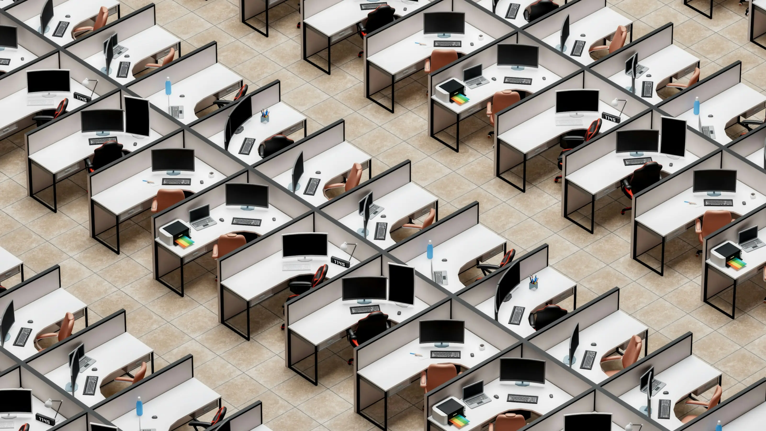 Rows of identical office cubicles, each with a desktop computer