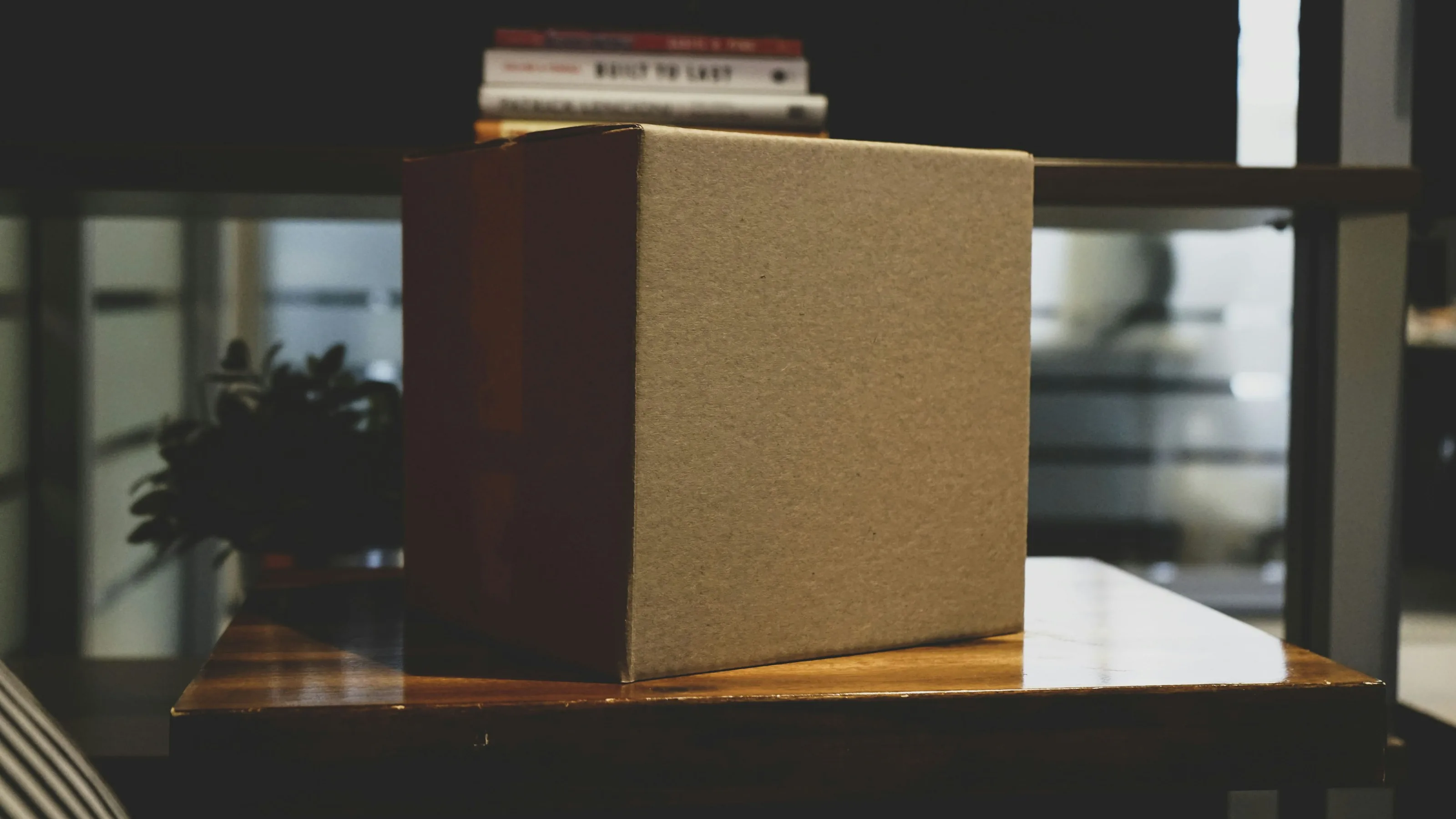 A cardboard box on a desk in an office