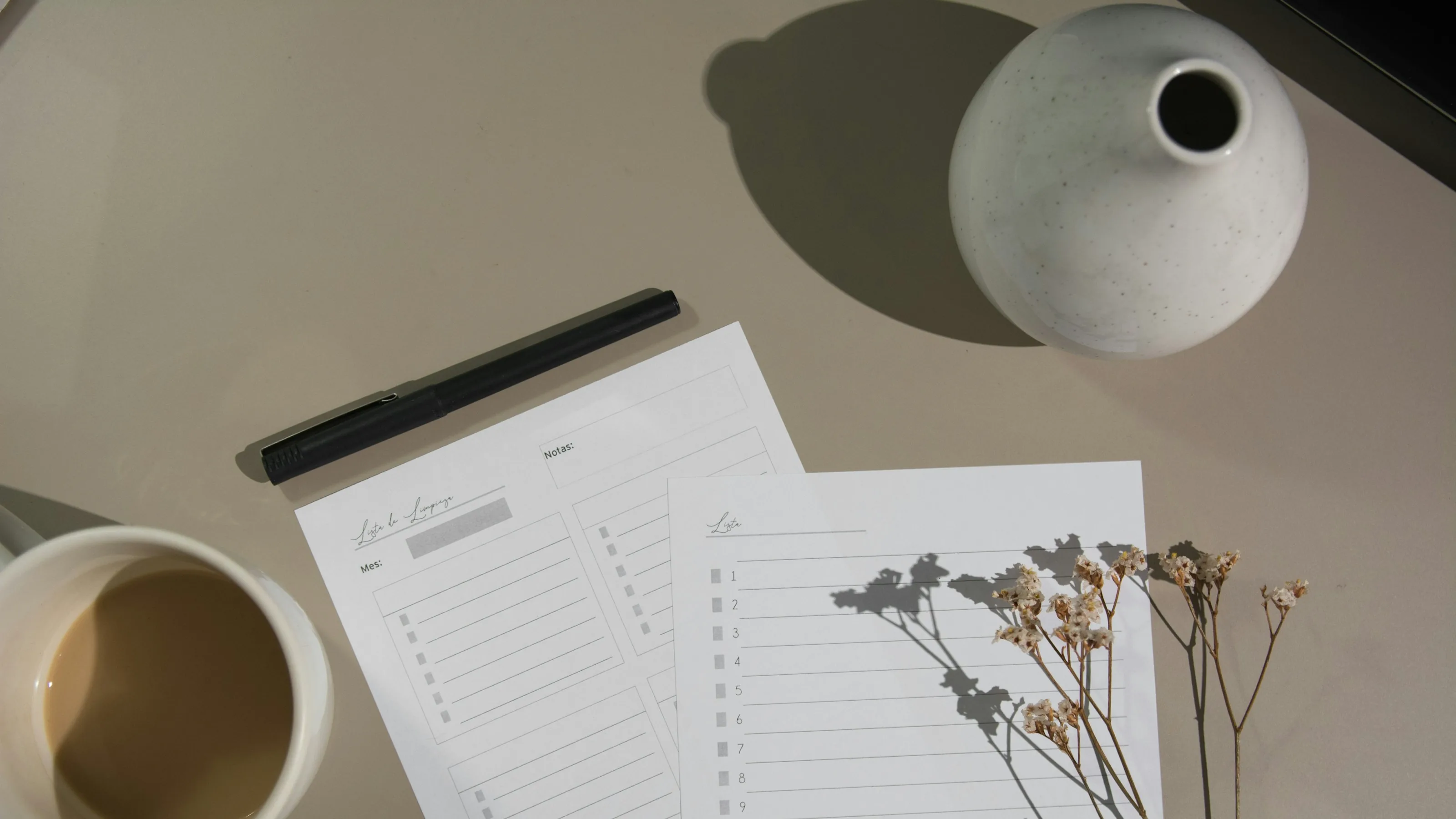 A checklist on a clipboard on an office desk